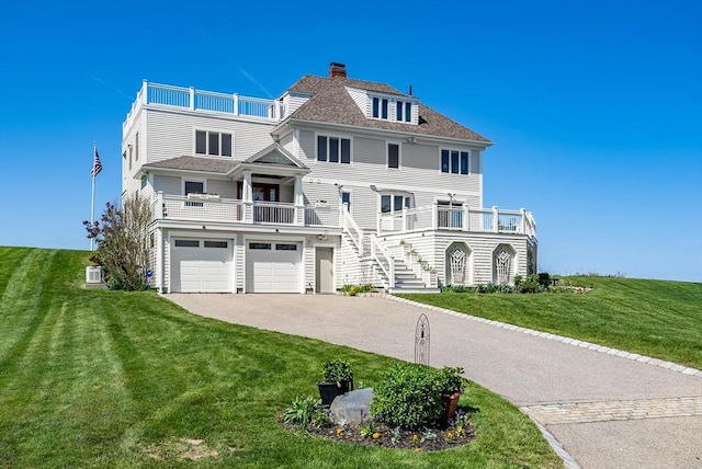 75 Point Allerton Ave, Hull, MA 02045 - coastal inspired home featuring driveway, an attached garage, a front yard, and a balcony