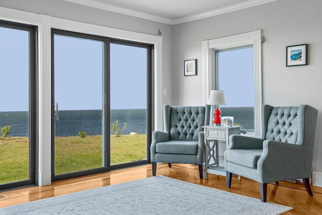 75 Point Allerton Ave, Hull, MA 02045 - living area featuring crown molding, a water view, and wood finished floors