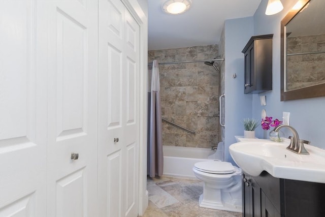 bathroom featuring vanity, toilet, and shower / bath combo with shower curtain