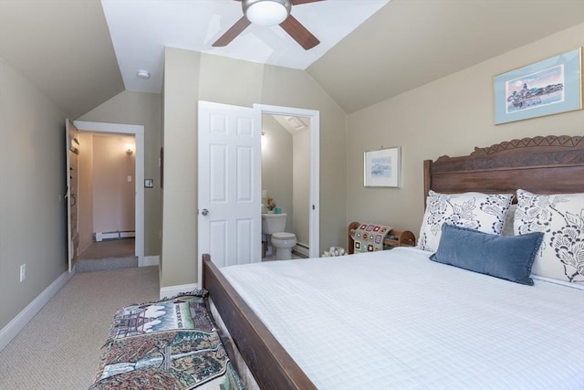 bedroom with lofted ceiling, baseboard heating, carpet floors, and ensuite bath