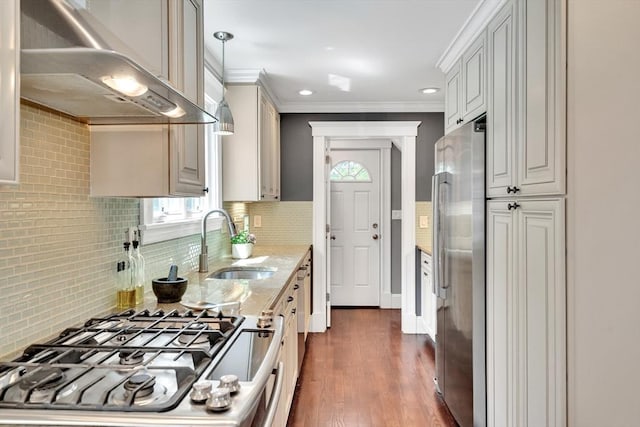 42 Sylvia Rd Unit 42, Medford, MA 02155 - kitchen featuring extractor fan, stove, stainless steel fridge, plenty of natural light, and ornamental molding