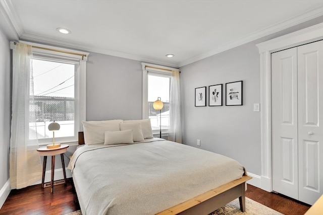 42 Sylvia Rd Unit 42, Medford, MA 02155 - bedroom featuring crown molding, baseboards, dark wood finished floors, recessed lighting, and a closet