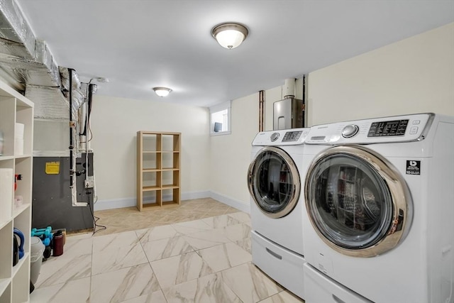 42 Sylvia Rd Unit 42, Medford, MA 02155 - washroom with washing machine and dryer and baseboards