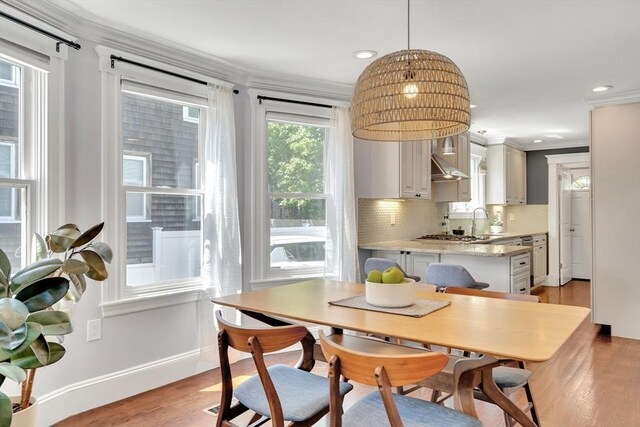 42 Sylvia Rd Unit 42, Medford, MA 02155 - dining space featuring ornamental molding, light wood finished floors, baseboards, and recessed lighting