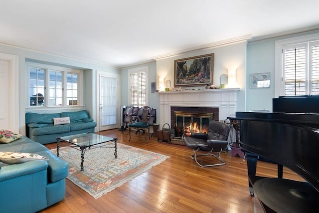 46 Central Ave, Newton, MA 02460 - living area with crown molding, a brick fireplace, and hardwood / wood-style flooring