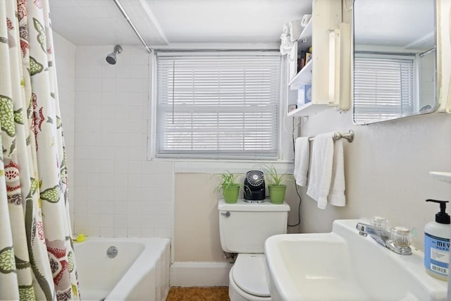 46 Central Ave, Newton, MA 02460 - bathroom featuring toilet, a sink, shower / tub combo, and a wealth of natural light