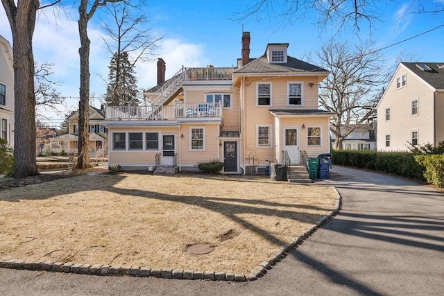 46 Central Ave, Newton, MA 02460 - view of front of house featuring a balcony and a chimney