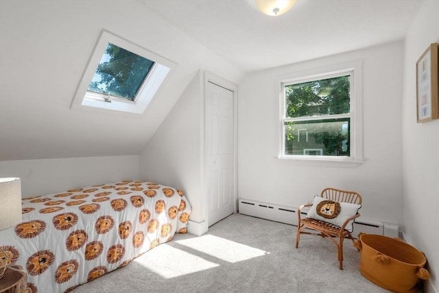28 Saltonstall Rd, North Andover, MA 01845 - bedroom featuring baseboard heating, a skylight, vaulted ceiling, carpet flooring, and a closet