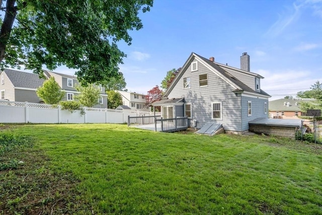 28 Saltonstall Rd, North Andover, MA 01845 - back of house with a chimney