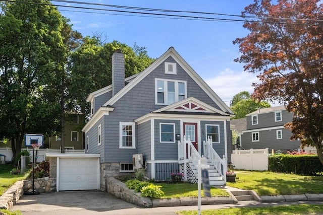 28 Saltonstall Rd, North Andover, MA 01845 - view of front of house featuring a chimney, driveway, and a garage