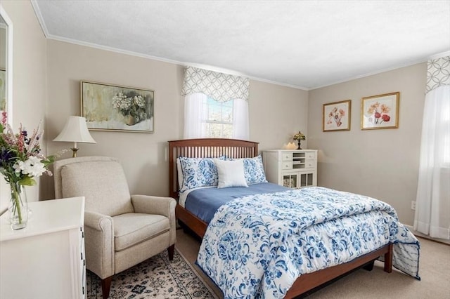 bedroom with crown molding, baseboards, and light carpet