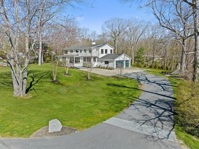 exterior space with covered porch and driveway