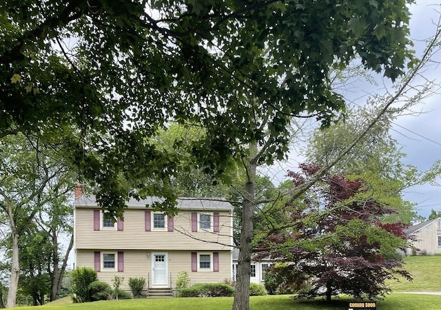 27 Albion Ln, West Newbury, MA 01985 - colonial home featuring a front yard, entry steps, and a chimney