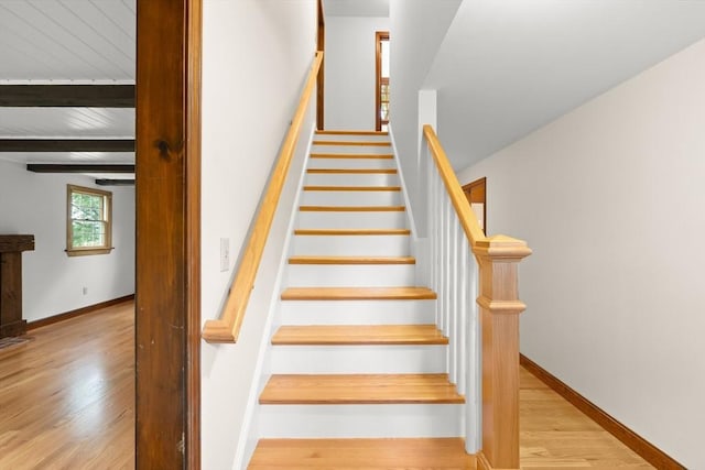 27 Albion Ln, West Newbury, MA 01985 - stairs featuring wood finished floors and beamed ceiling