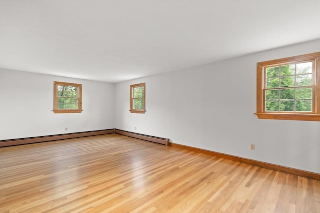 27 Albion Ln, West Newbury, MA 01985 - empty room with healthy amount of natural light and light wood finished floors