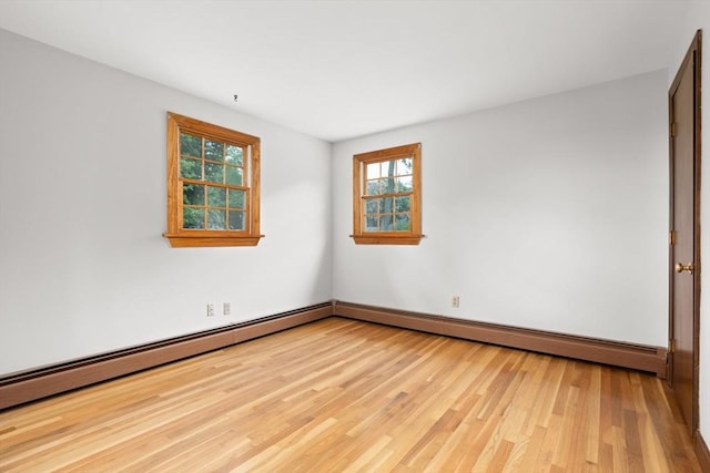 27 Albion Ln, West Newbury, MA 01985 - unfurnished room with light wood-style flooring and baseboard heating
