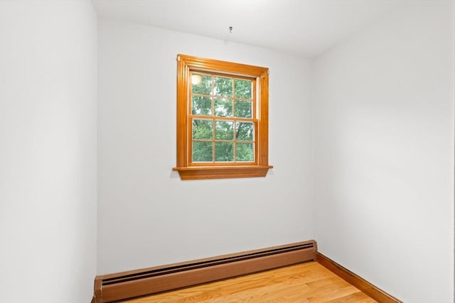 27 Albion Ln, West Newbury, MA 01985 - unfurnished room featuring baseboard heating and light wood-style floors