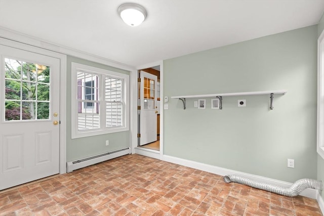 27 Albion Ln, West Newbury, MA 01985 - doorway featuring a baseboard radiator and brick floors