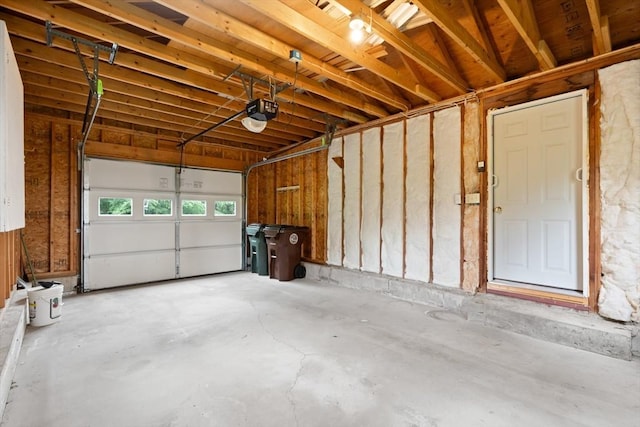 27 Albion Ln, West Newbury, MA 01985 - garage featuring a garage door opener