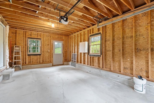 27 Albion Ln, West Newbury, MA 01985 - garage featuring a garage door opener