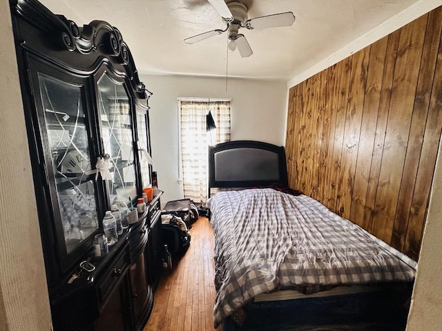 32 Ames St, Worcester, MA 01604 - bedroom featuring wood finished floors, wood walls, and ceiling fan