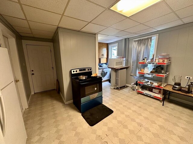 32 Ames St, Worcester, MA 01604 - kitchen featuring white appliances, tile patterned floors, and a paneled ceiling