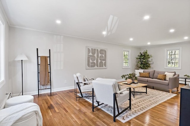 living area featuring recessed lighting, ornamental molding, and plenty of natural light