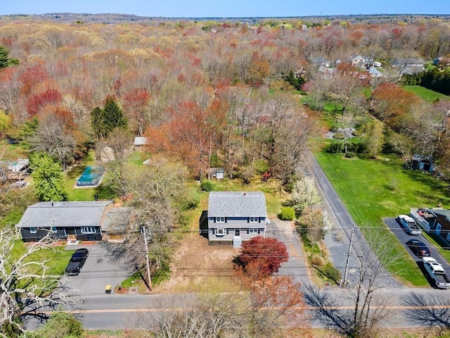 aerial view featuring a view of trees