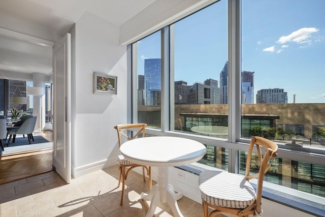 sunroom with a city view