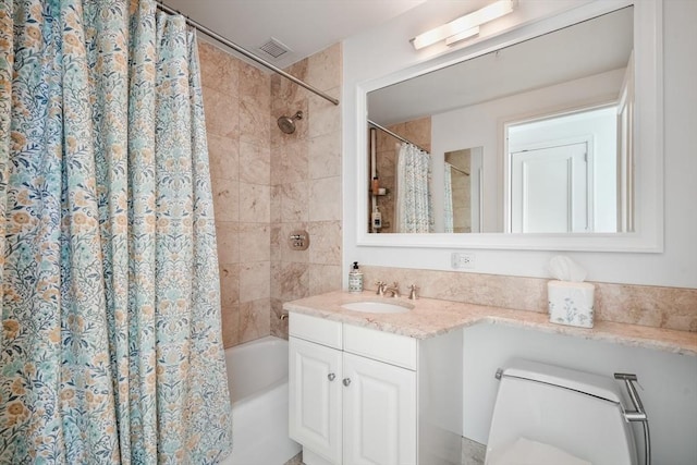 bathroom featuring shower / tub combo with curtain and vanity
