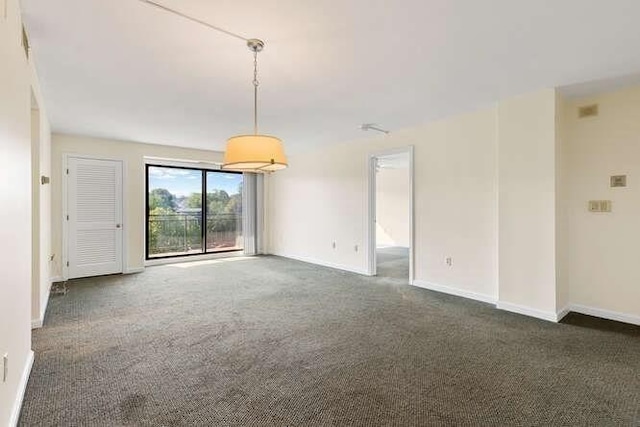 196 Locust Unit 2-508, Lynn, MA 01904 - unfurnished room featuring dark colored carpet