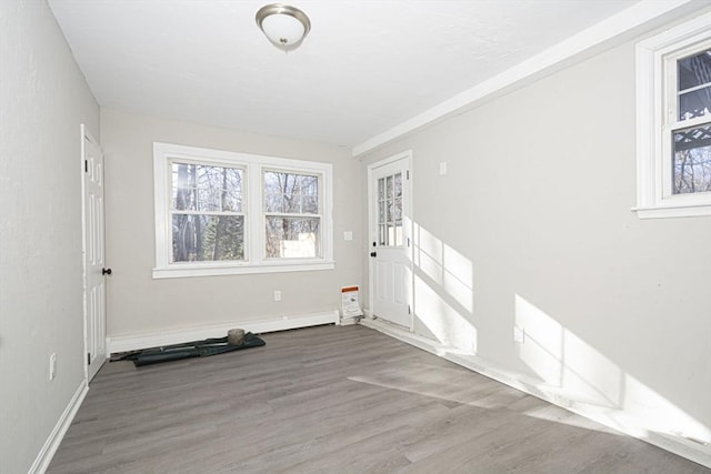 empty room featuring hardwood / wood-style floors