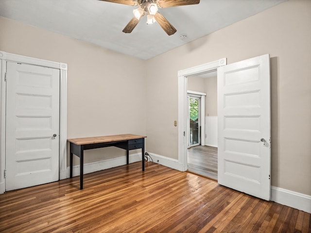 miscellaneous room with wood-type flooring and ceiling fan