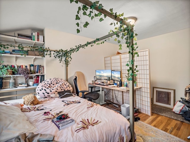 bedroom featuring light wood-type flooring