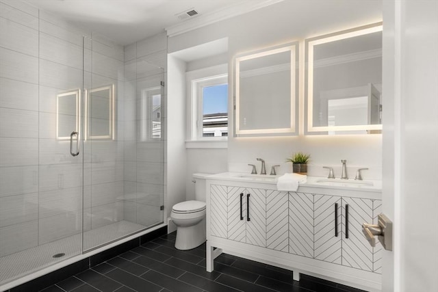 37-39 Governor Winthrop Rd, Somerville, MA 02145 - full bath with a sink, toilet, visible vents, ornamental molding, and a stall shower