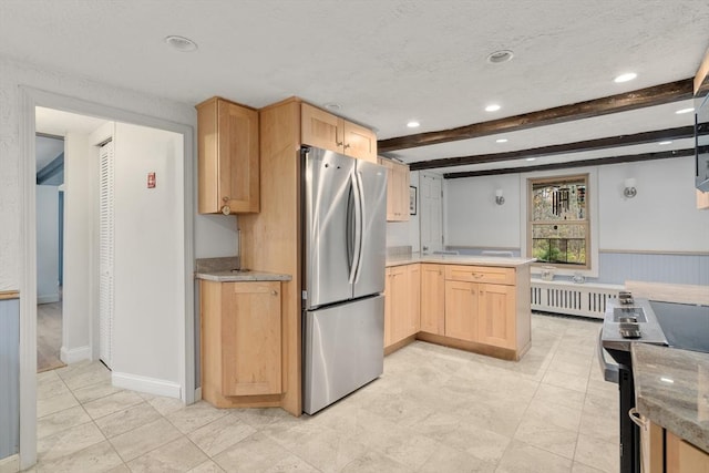 kitchen with recessed lighting, appliances with stainless steel finishes, light brown cabinets, and a peninsula