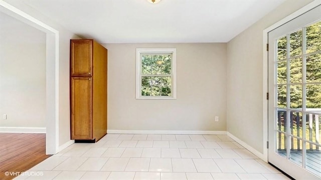 4 Gary Rd, Norton, MA 02766 - unfurnished bedroom with multiple windows, access to outside, and baseboards