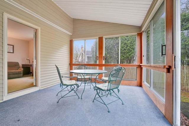 sunroom with lofted ceiling