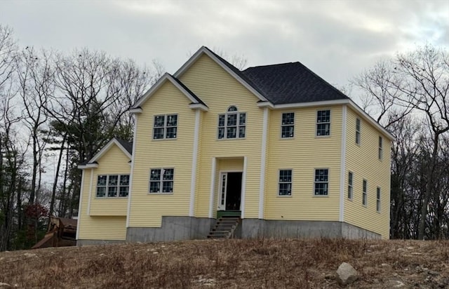 view of front of property with entry steps