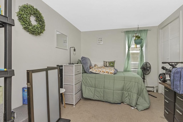 bedroom featuring carpet floors and baseboard heating