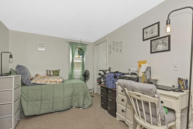 bedroom featuring light carpet