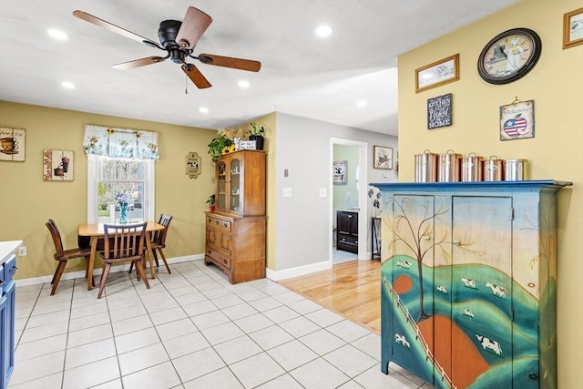 dining space featuring light tile patterned floors, baseboards, a ceiling fan, and recessed lighting