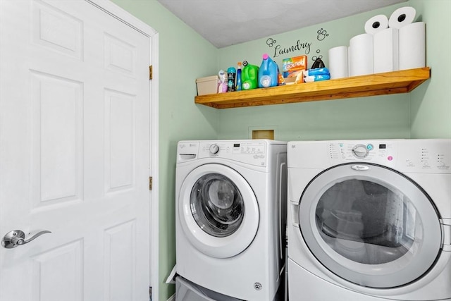 laundry area with independent washer and dryer and laundry area