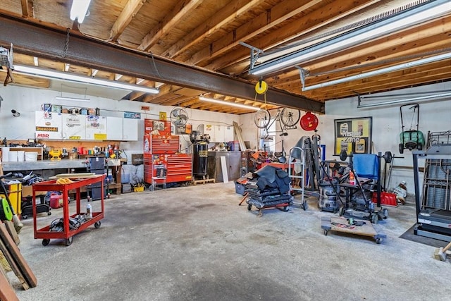 garage with a workshop area