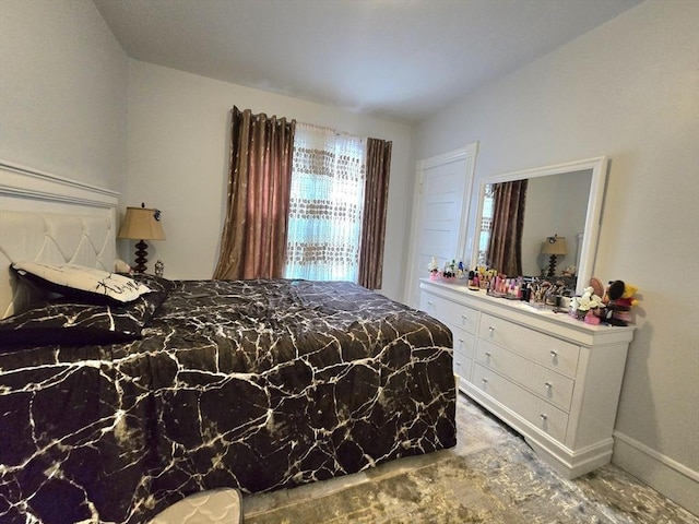 bedroom with baseboards