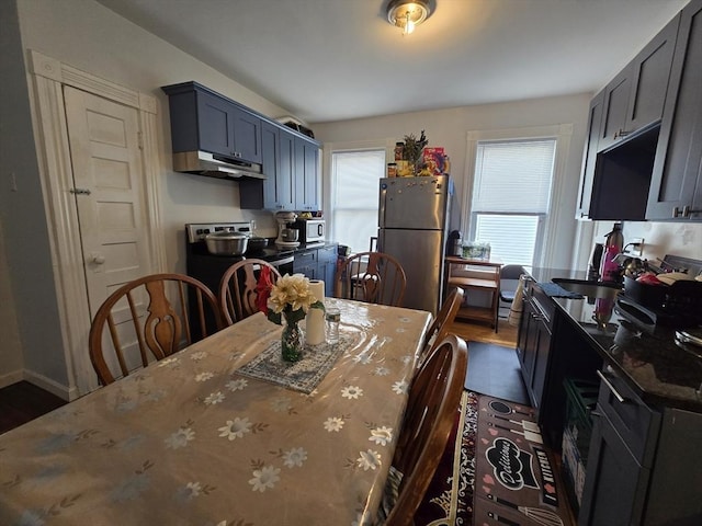 dining room featuring dark wood-style flooring