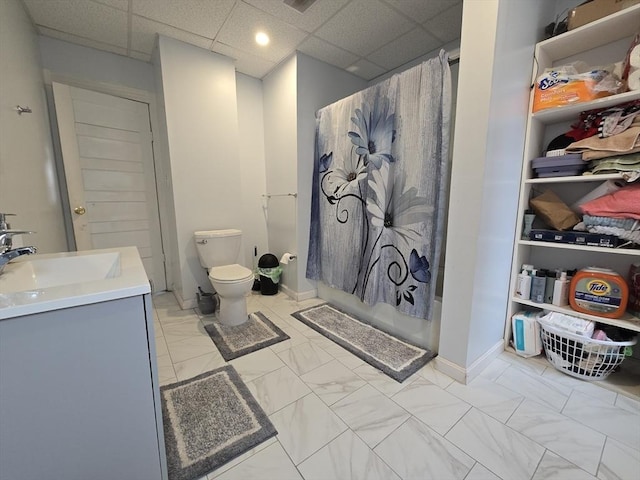 full bath featuring marble look tile flooring, toilet, a shower with shower curtain, and vanity