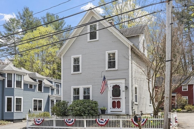view of front facade with a fenced front yard