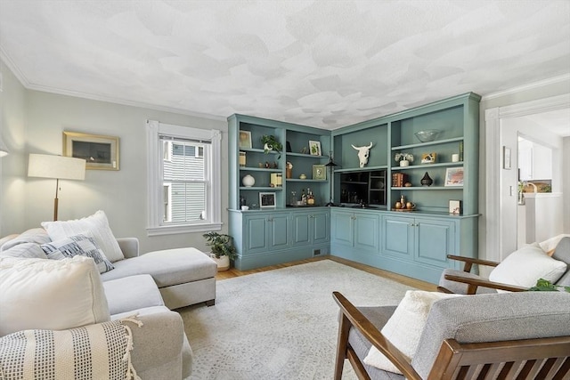 living area with crown molding and light wood-type flooring