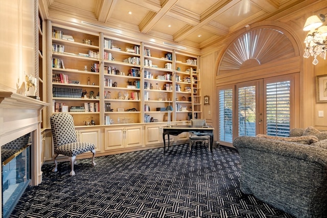 living area featuring dark carpet, wooden walls, a fireplace, and coffered ceiling